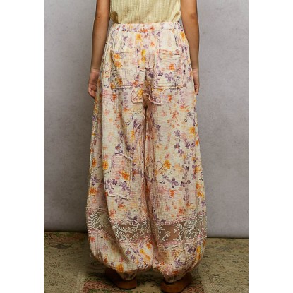 PANTALON NARANJA  LILA FLORAL