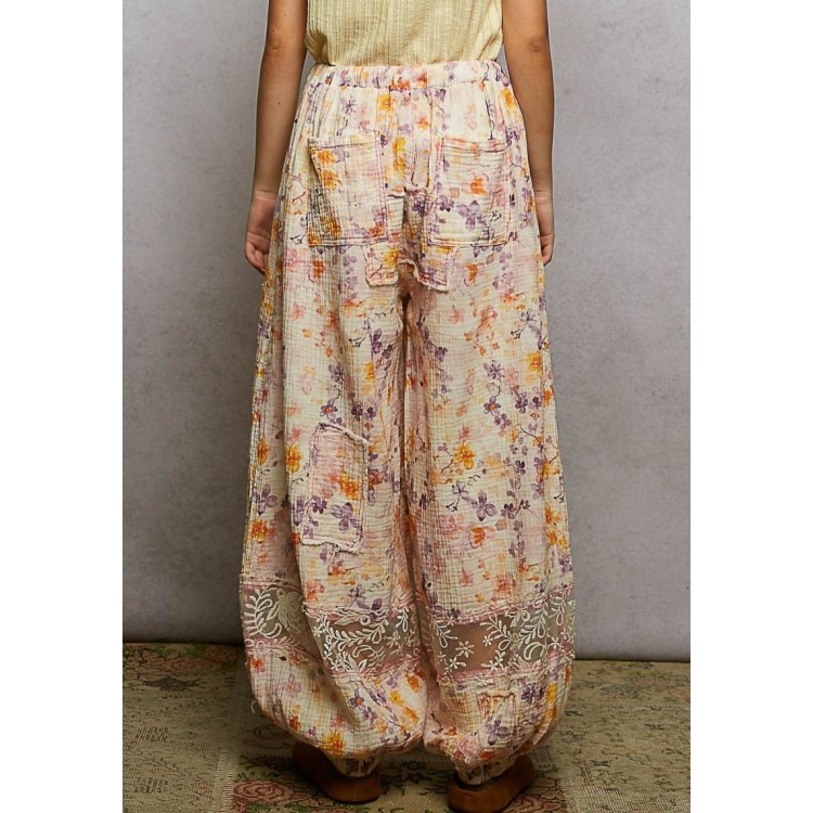 PANTALON NARANJA  LILA FLORAL