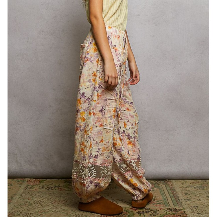 PANTALON NARANJA  LILA FLORAL