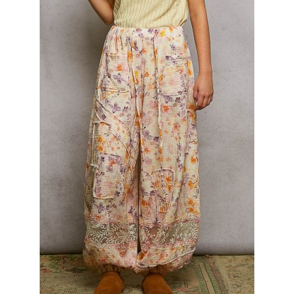 PANTALON NARANJA  LILA FLORAL