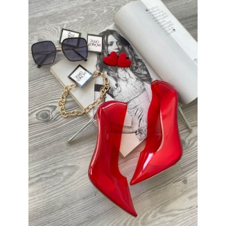STILETO ROJO TRANSPARENTE